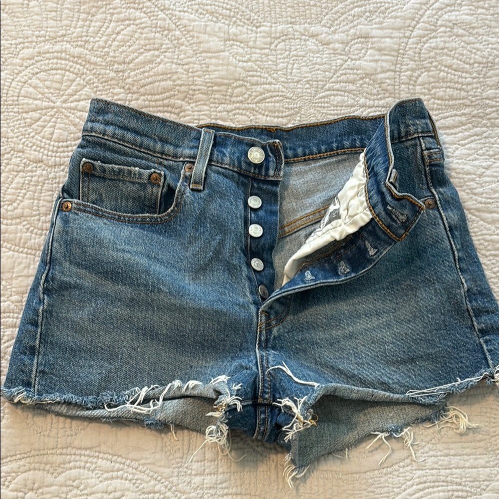 Blue High-Waisted Jean Shorts with Distressed Hem